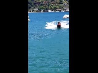 braz rides a jet ski at its peak